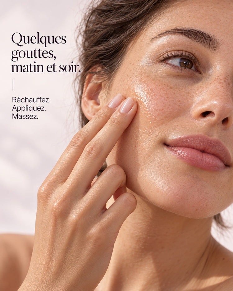 Application de l’huile visage sur la joue avec le bout des doigts. Quelques gouttes, matin et soir. — Réchauffez. Appliquez. Massez.